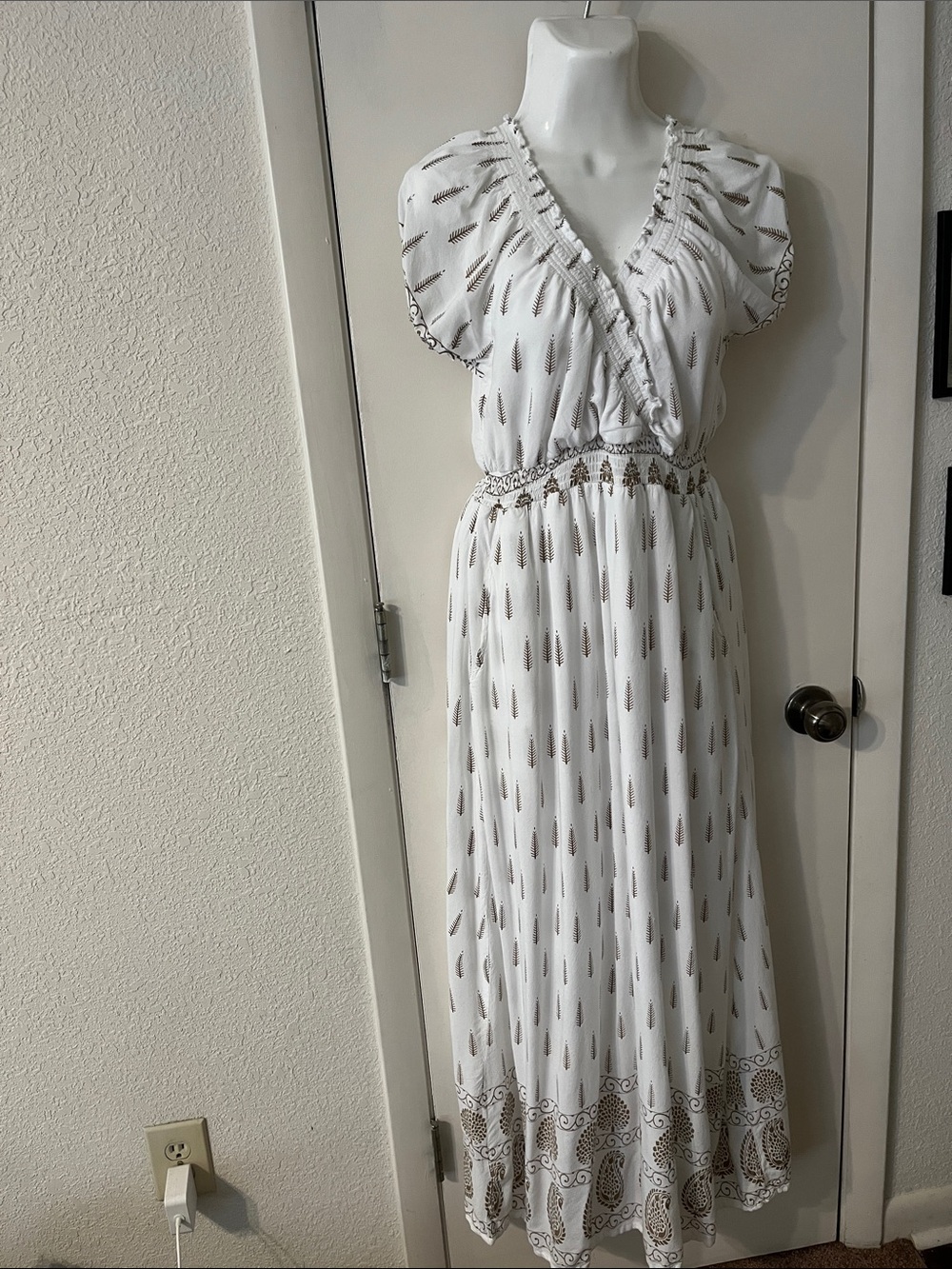 White Maxi Dress with Gold Motif and V-Neck
